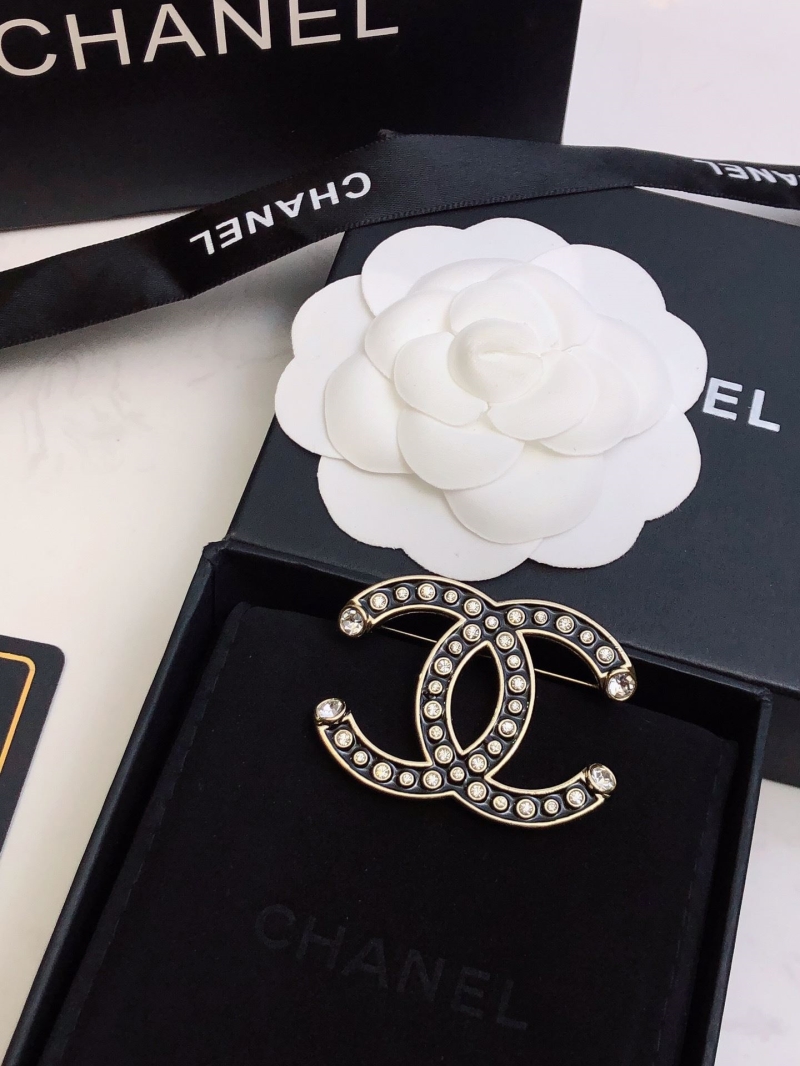 Ch**el brooches